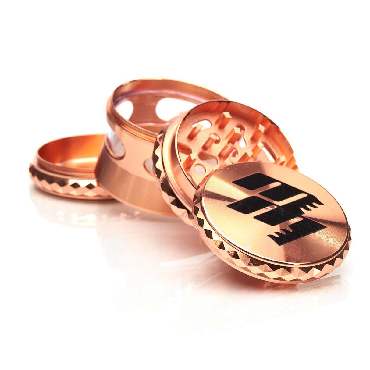 MOB Mulcher Dry Herb 4-piece Grinder with magnetic lid and stylish detailing. Available in black or rose gold.