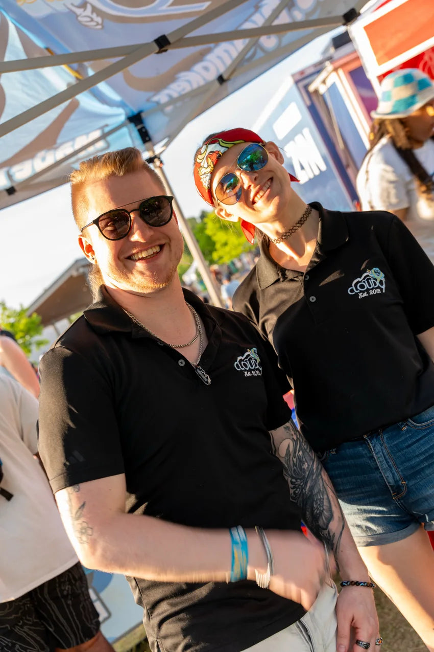 Two Cloud 9 team members together outdoors