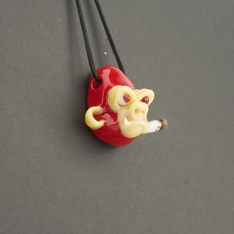 "Smoking Chimp Pendant - Red" By John Fischbach 1