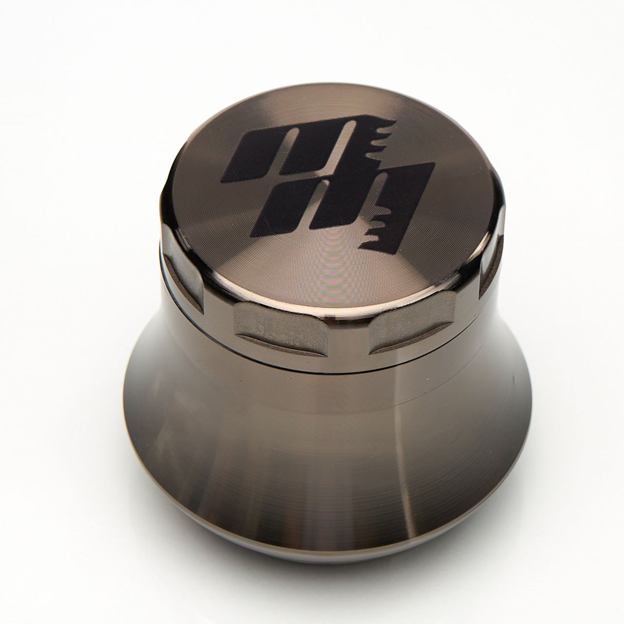 MOB Mulcher UFO 4-piece herb grinder with stainless steel screen and scraper. Comes in black, rose, black and rose gold, and rose gold and black