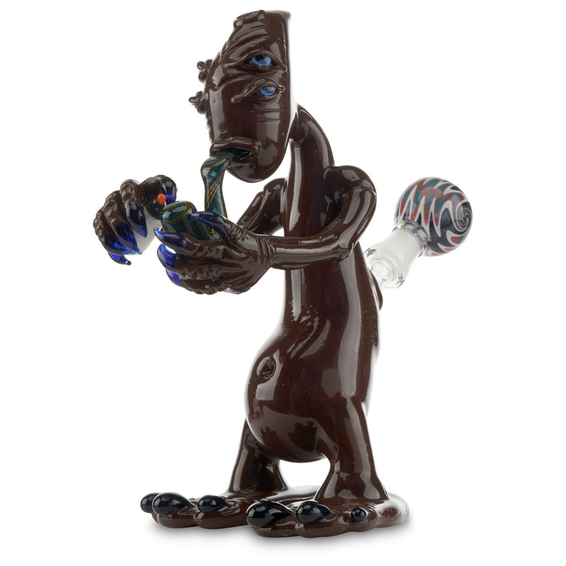 sandal glass lit alien pipe that is smoking a hand pipe getting lit